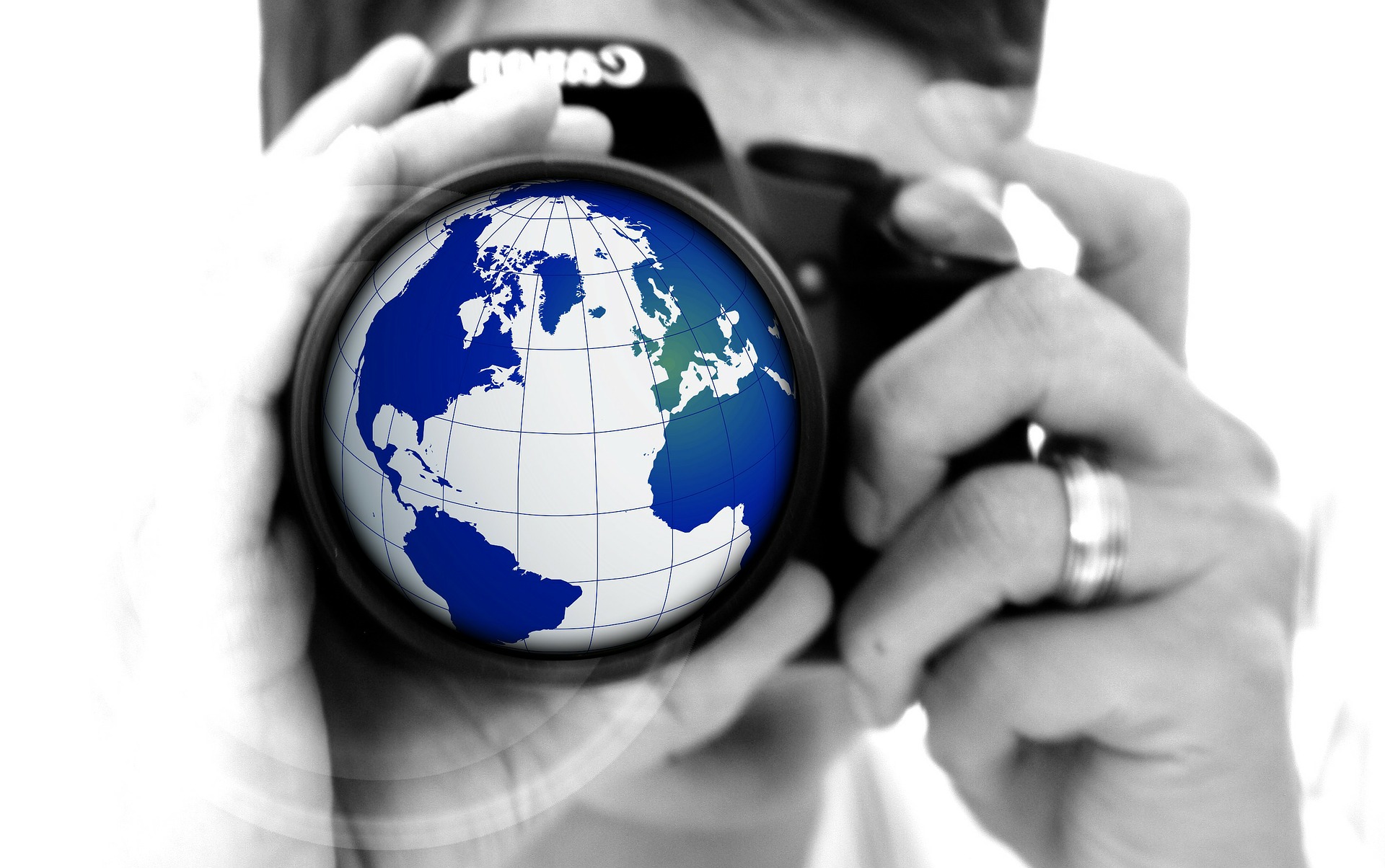 Photo of human taking picture of the world