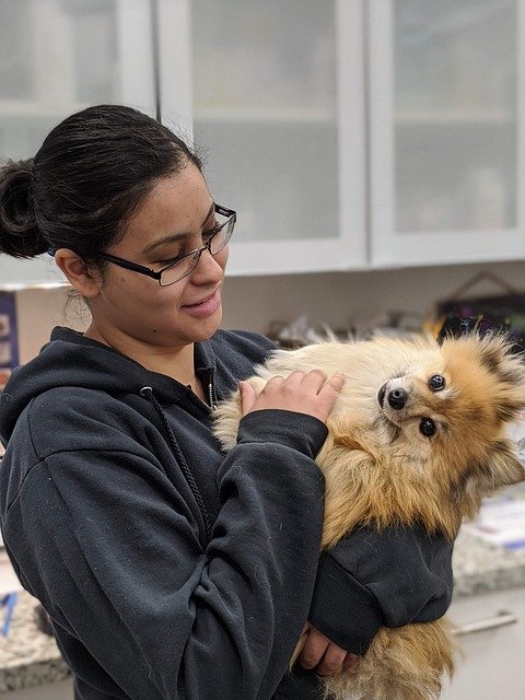 Picture of woman holding dog